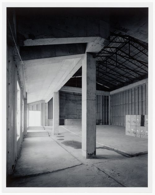 Interior view of the Paul Desmarais Theatre showing columns and metal roof trusses, Canadian Centre for Architecture under construction, Montréal, Québec