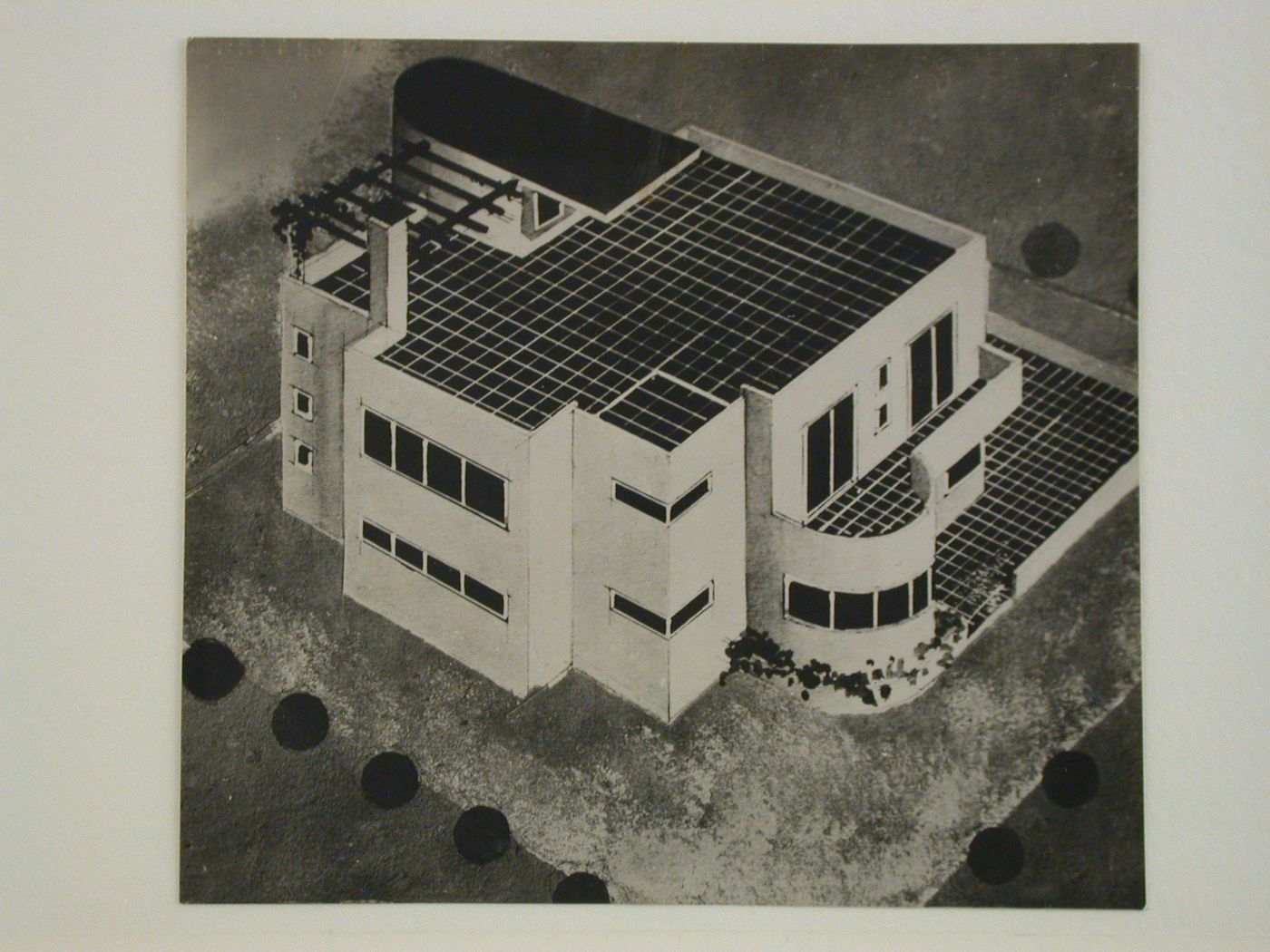View of a painted drawing showing a house with a tiled veranda, yard and terrace on the roof