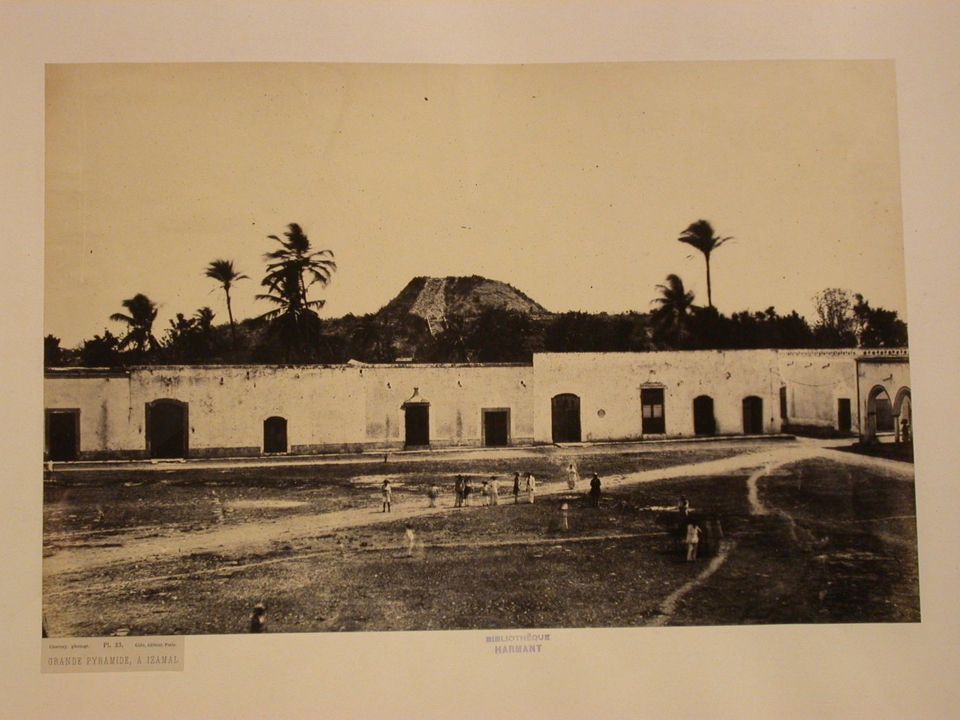 View of a plaza and buildings with the Kinich Kak Mo (also known as the Great Pyramid) in the background, Izamal, Mexico