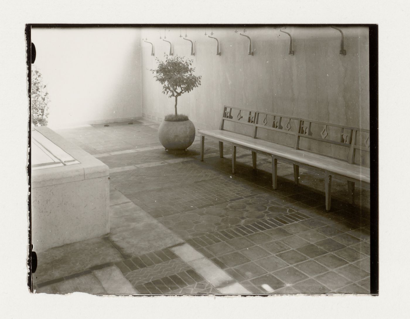 Interior view of the Chapel of Faith showing pews and ceramic floor tiles [?], Woodland Crematorium and Cemetery, Stockholm
