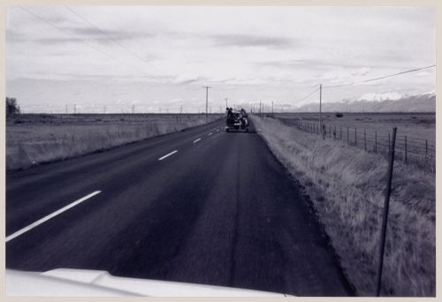 Photograph showing truck painting a line down a road for the Red Line project
