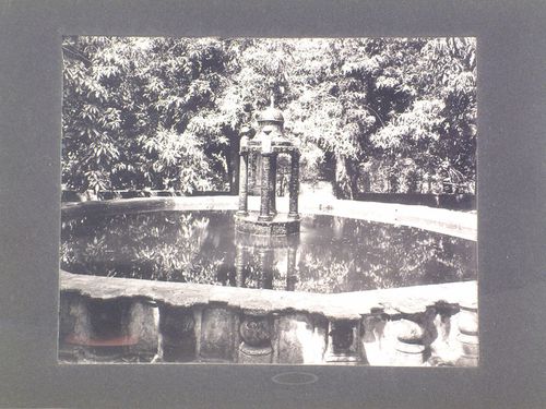 Partial view of a fountain in the Jardín Borda with trees in the background, Cuernavaca, Mexico