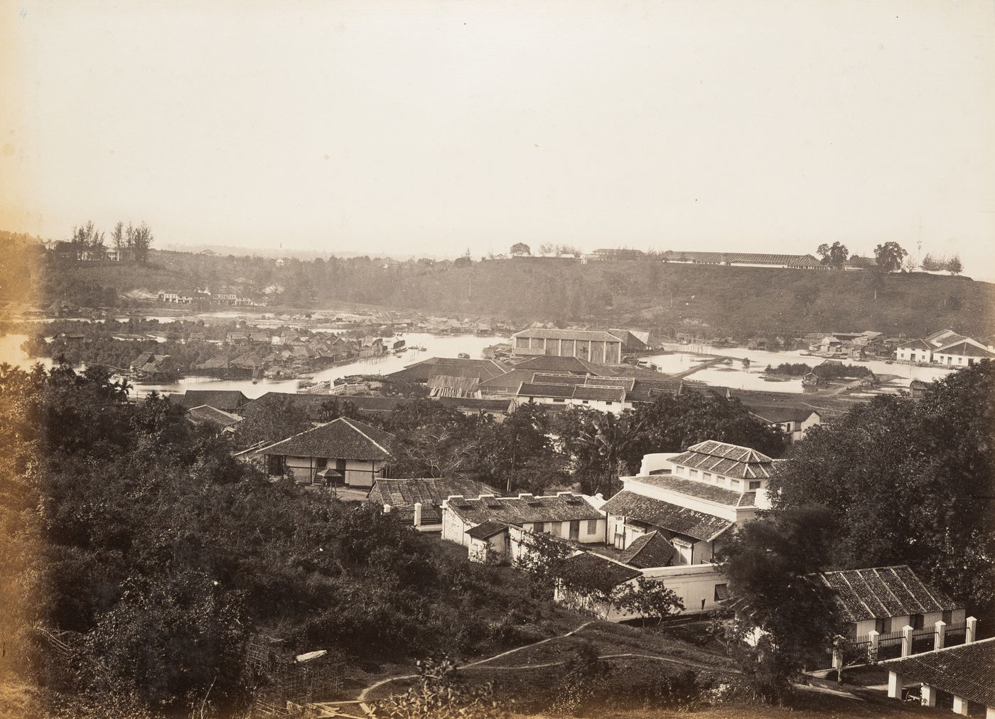View of a Malay Village with Fort Canning ? on the hill, Singapore