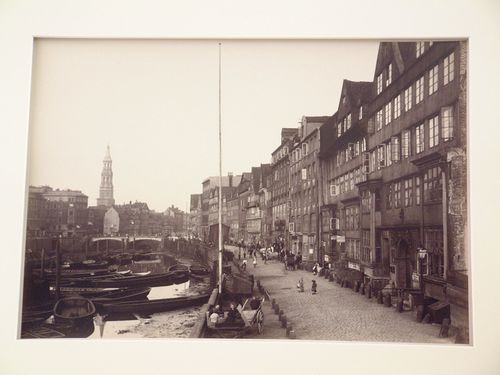 View of Kehrwieder street with church of Saint Catherine in distance, Hamburg, Germany