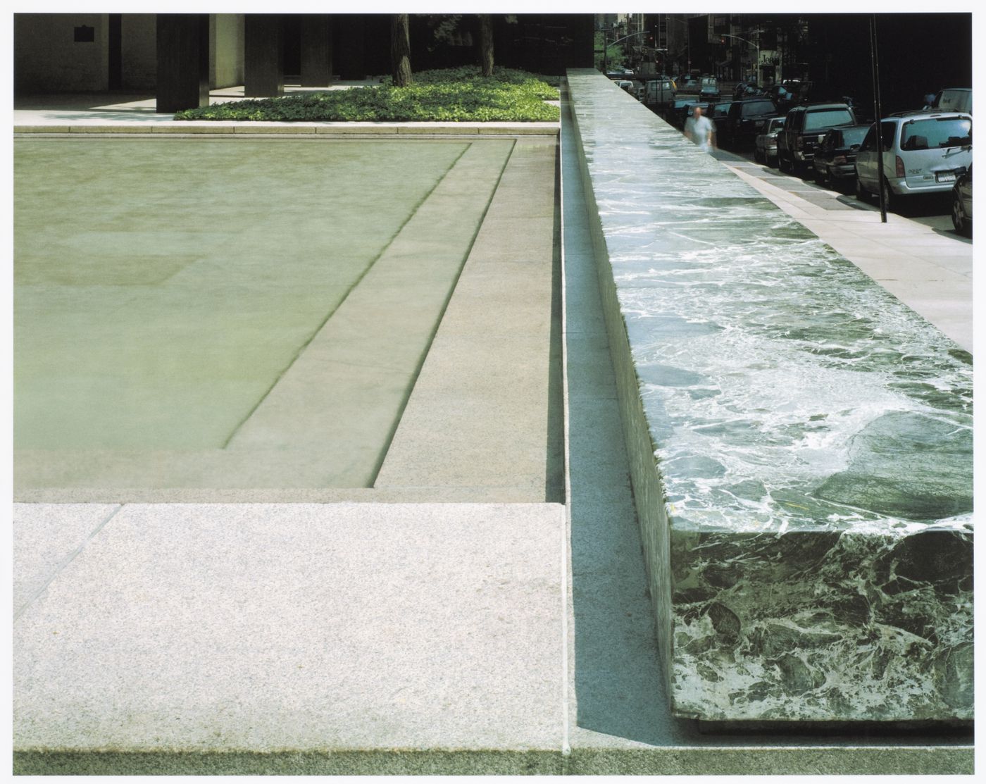 Seagram Building, New York: the plaza, verd-antique marble bench, and pool