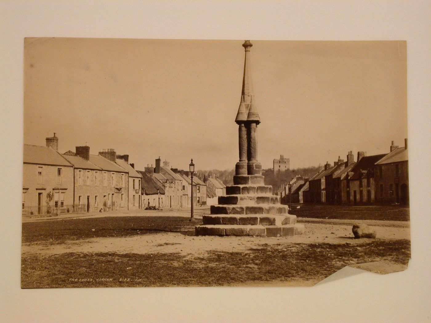 View of the lower section of the Market Cross, Norham, Northumberland, England