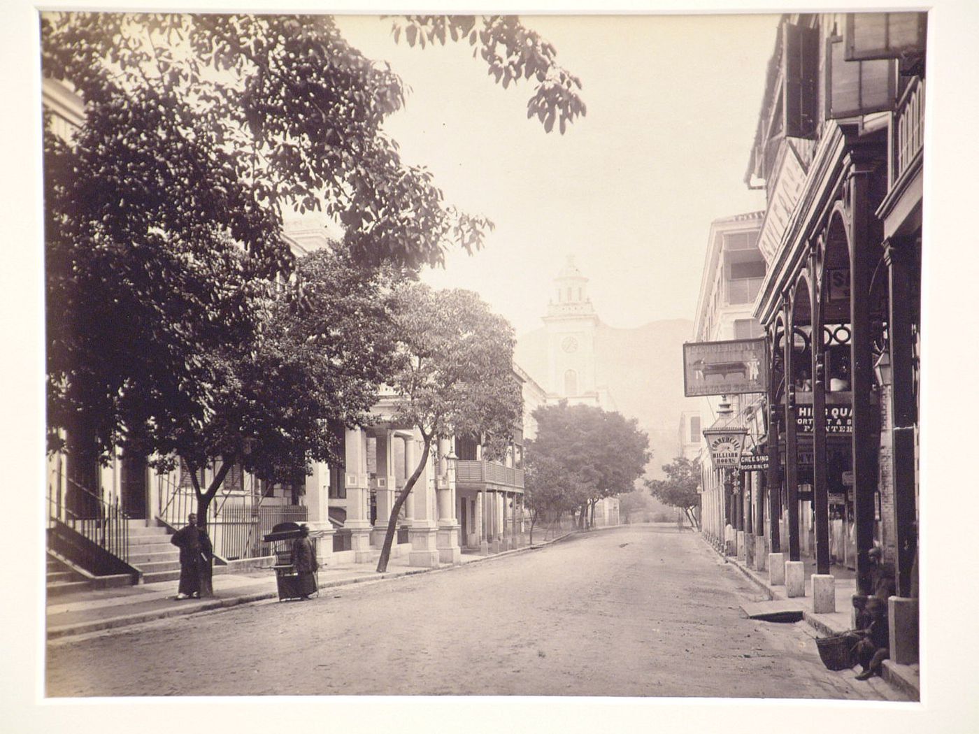 View of Queen's Road looking northwest with the Clock Tower in the background with the Hong-Kong Hotel to the right, Hong Kong (now Hong Kong, China)