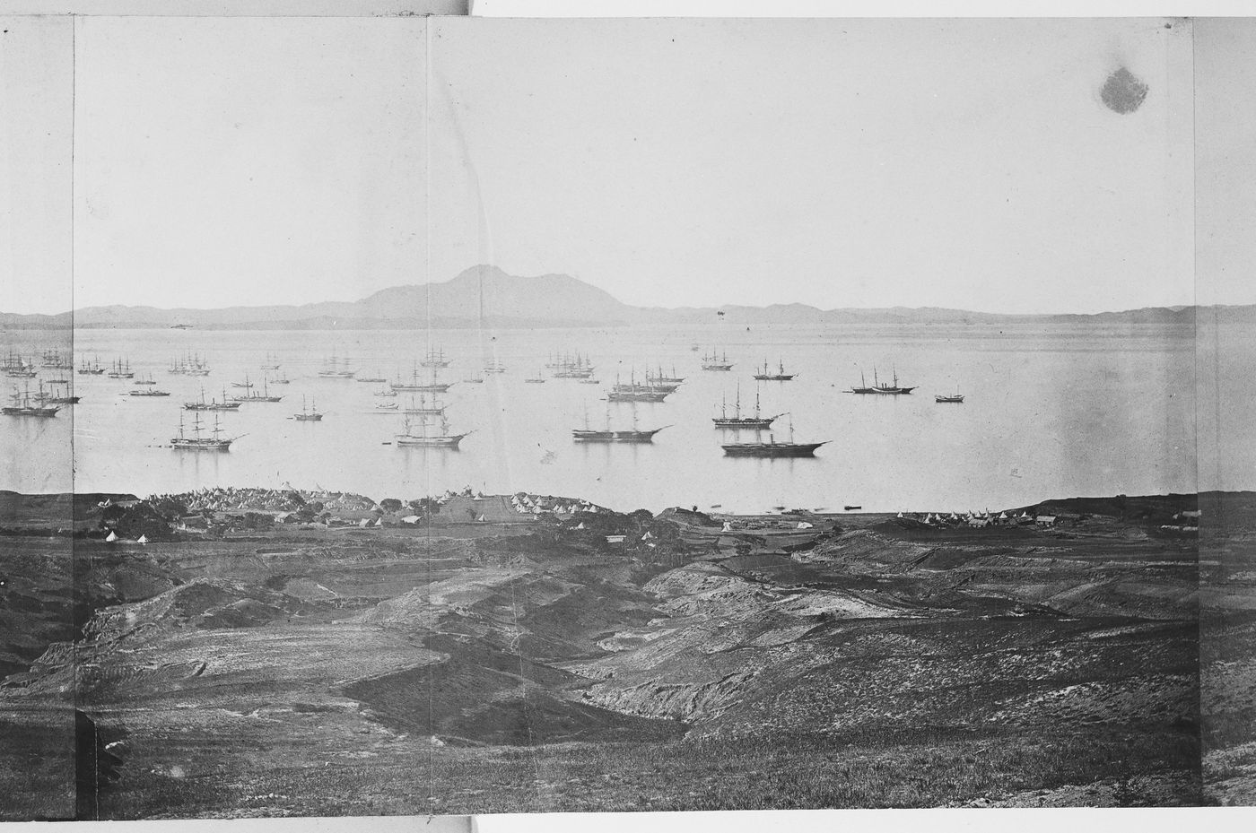 View of Victoria Bay, adjacent to Talien Bay (now Dalian Wan), showing military camps and farmland, near Ch'ing-ni-wa (now part of Dalian), China
