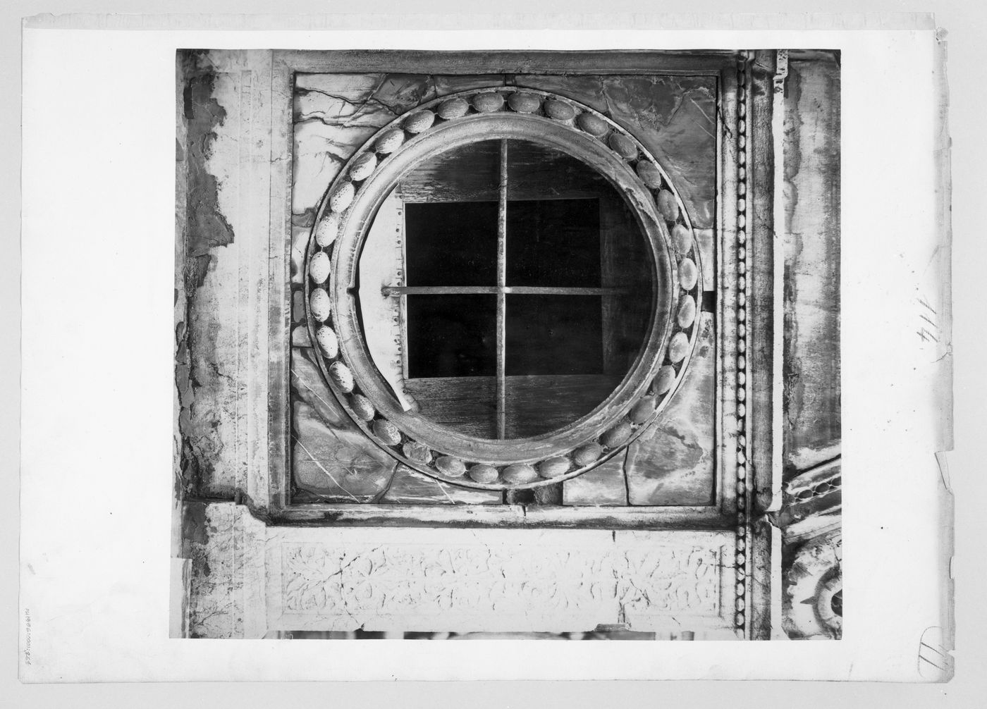 Detail view of round window on the exterior facade of the church of Santa Maria dei Miracoli, Brescia, Lombardy, Italy