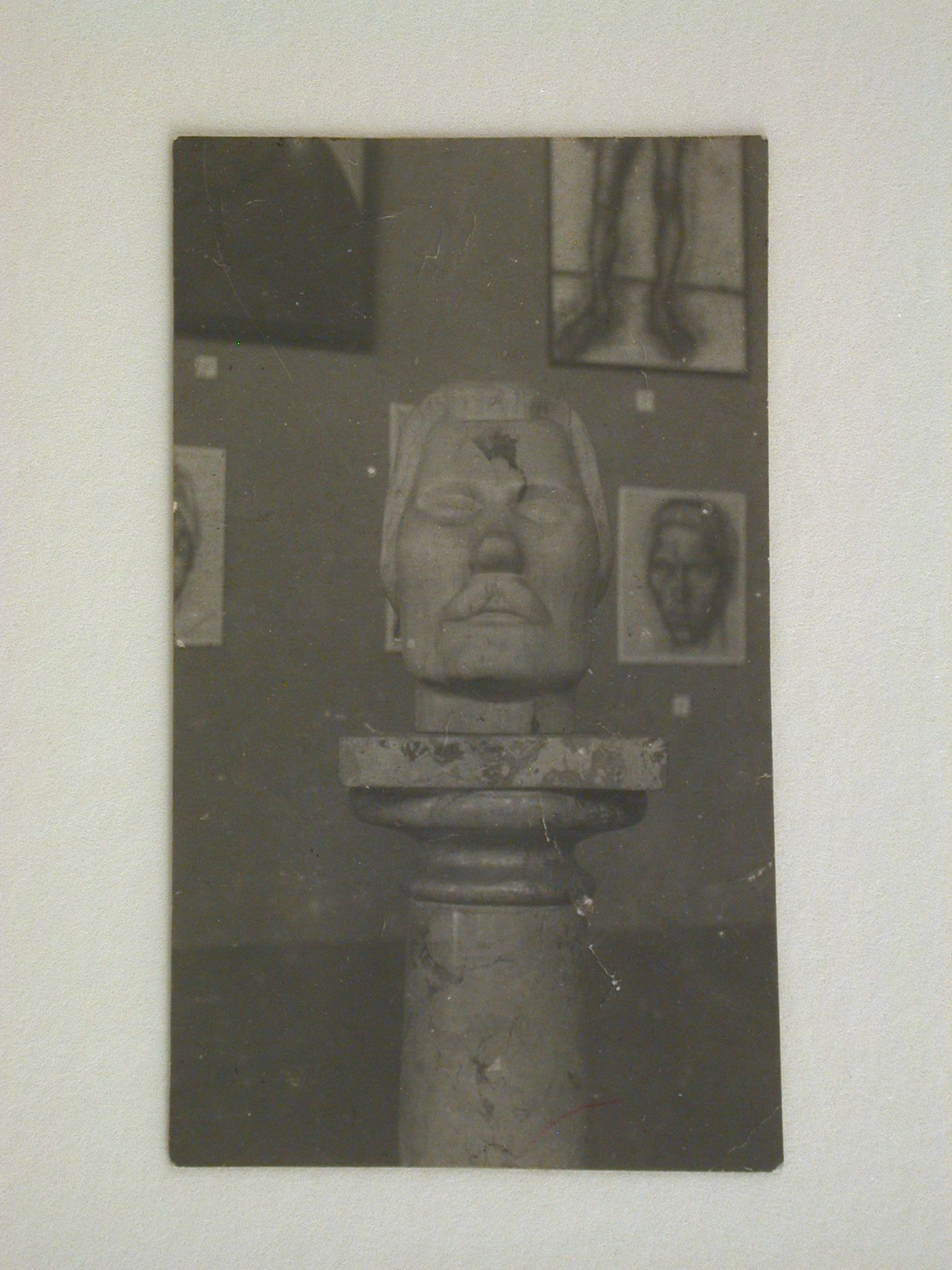 View of a sculpted head of Maxim Gorki with figure study drawings in the background, Soviet Union