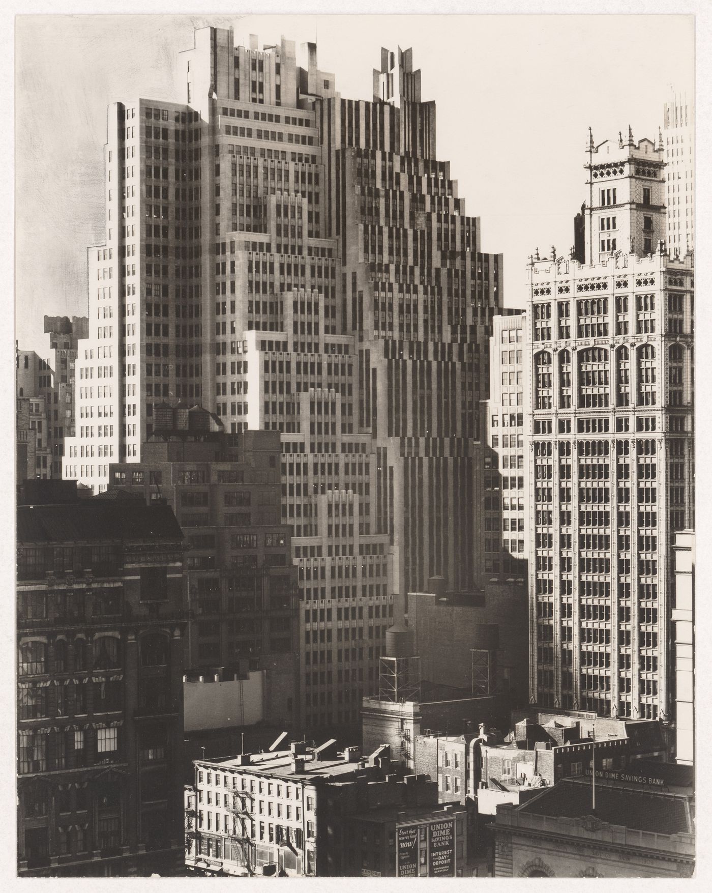 View of 40th St. between 6th and 7th Avenues, showing the Bryant Park Studio Building and the World Tower Building, New York City, New York