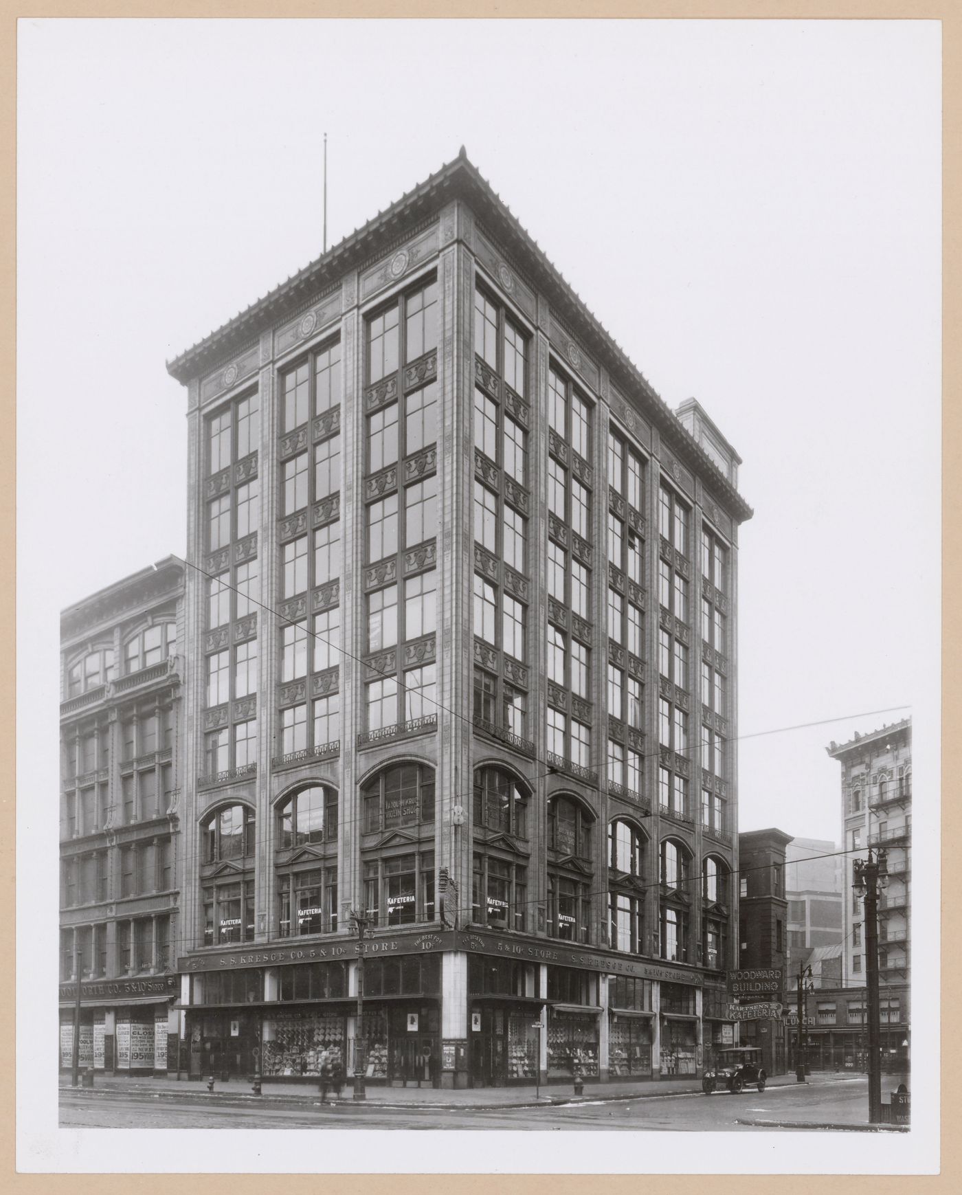 View of the principal and lateral façades of the Siegel Building (also known as the Woodward Building [?]) showing the S.S. Kresge Co. 5 & 10 c. Store, Woodward and Clifford Streets, Detroit, Michigan