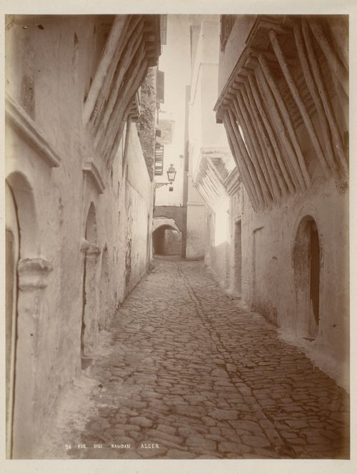 View of archway and cobblestone of Sidi Ramdane road, Algiers, Algeria