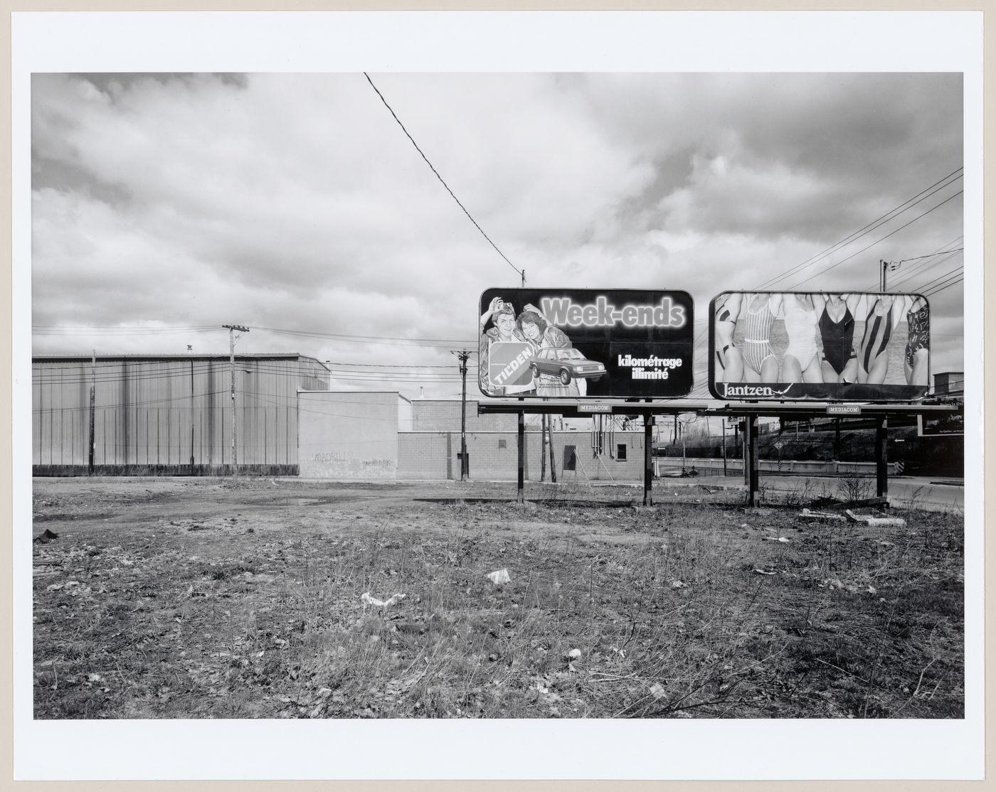 View of billboards at the corner of Wellington and Bridge Streets, Montréal, Québec