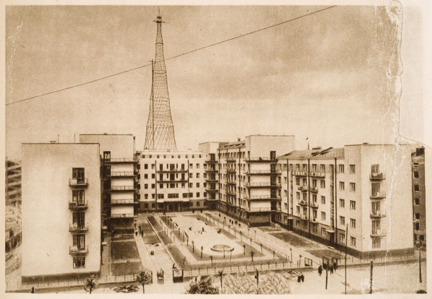 Exterior view of the First House Commune and the Shabolovsky Broadcasting Station aerial tower from the magazine "USSR in Construction", Moscow