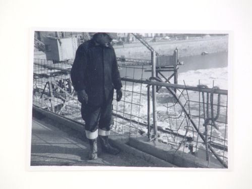 View of a man standing on the Barnstaple Long Bridge, Devon, United Kingdom