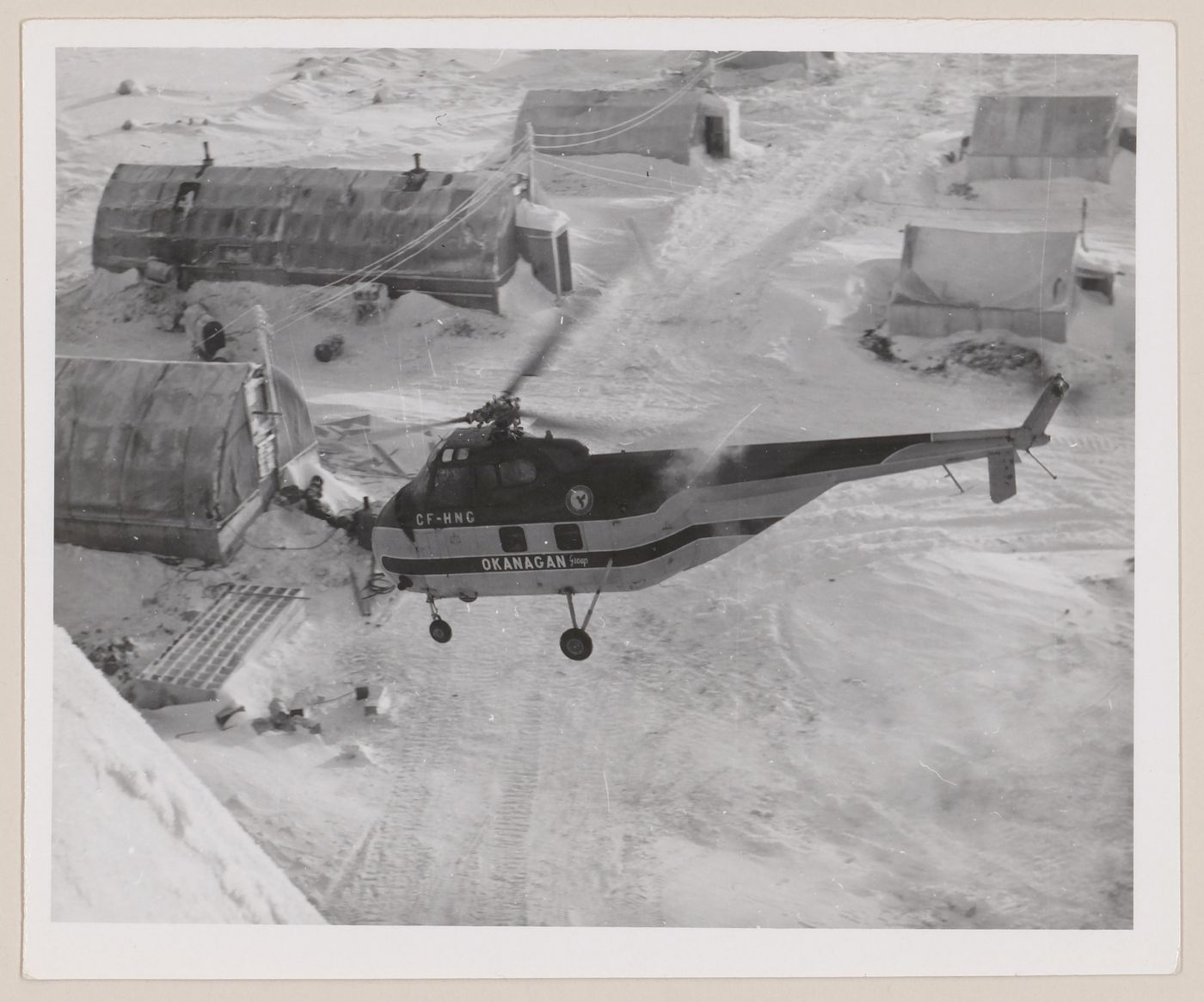 View of Okanagan helicopter at DEW Line radar station FOX-3, Dewar Lakes, Nunavut, Canada