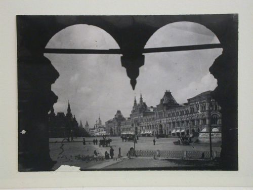 View of Red Square from a window showing the Historical Museum in the background and the Upper Shopping Arcades on the right, Moscow
