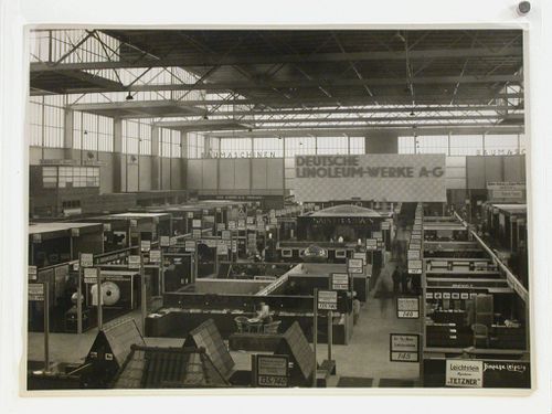 Overview of trade show linoleum exhibit booths, Leipzig [?], Germany