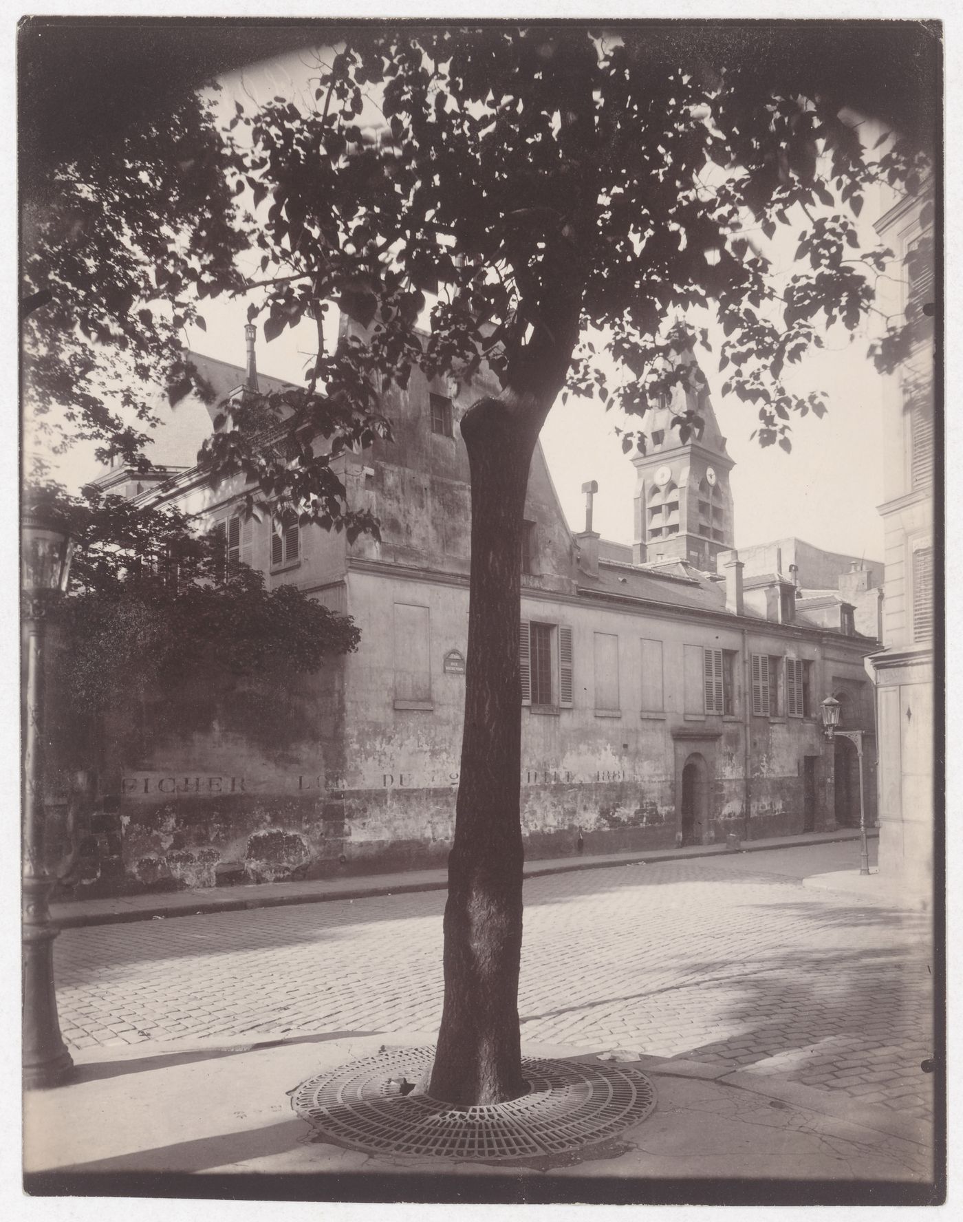 Rue Daubenton, with belfry of Église de Saint Médard in background, Paris, France