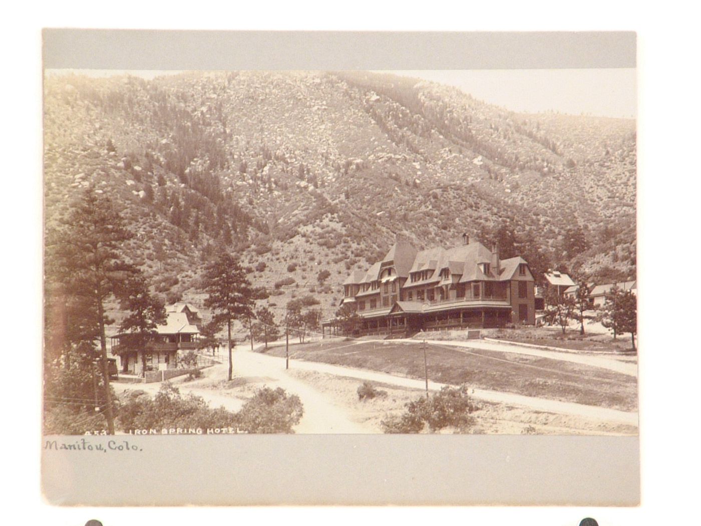 View of the Iron Springs Hotel with mountains in the background, Manitou Springs, Colorado, United States
