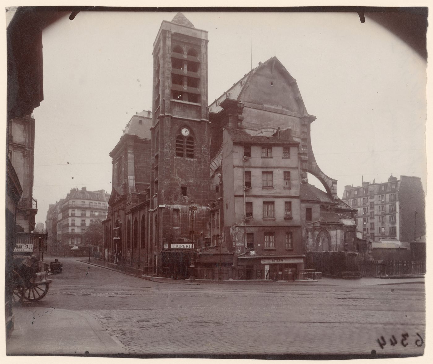 Exterior of Saint Nicholas du Chardonnet and several houses, Paris, France