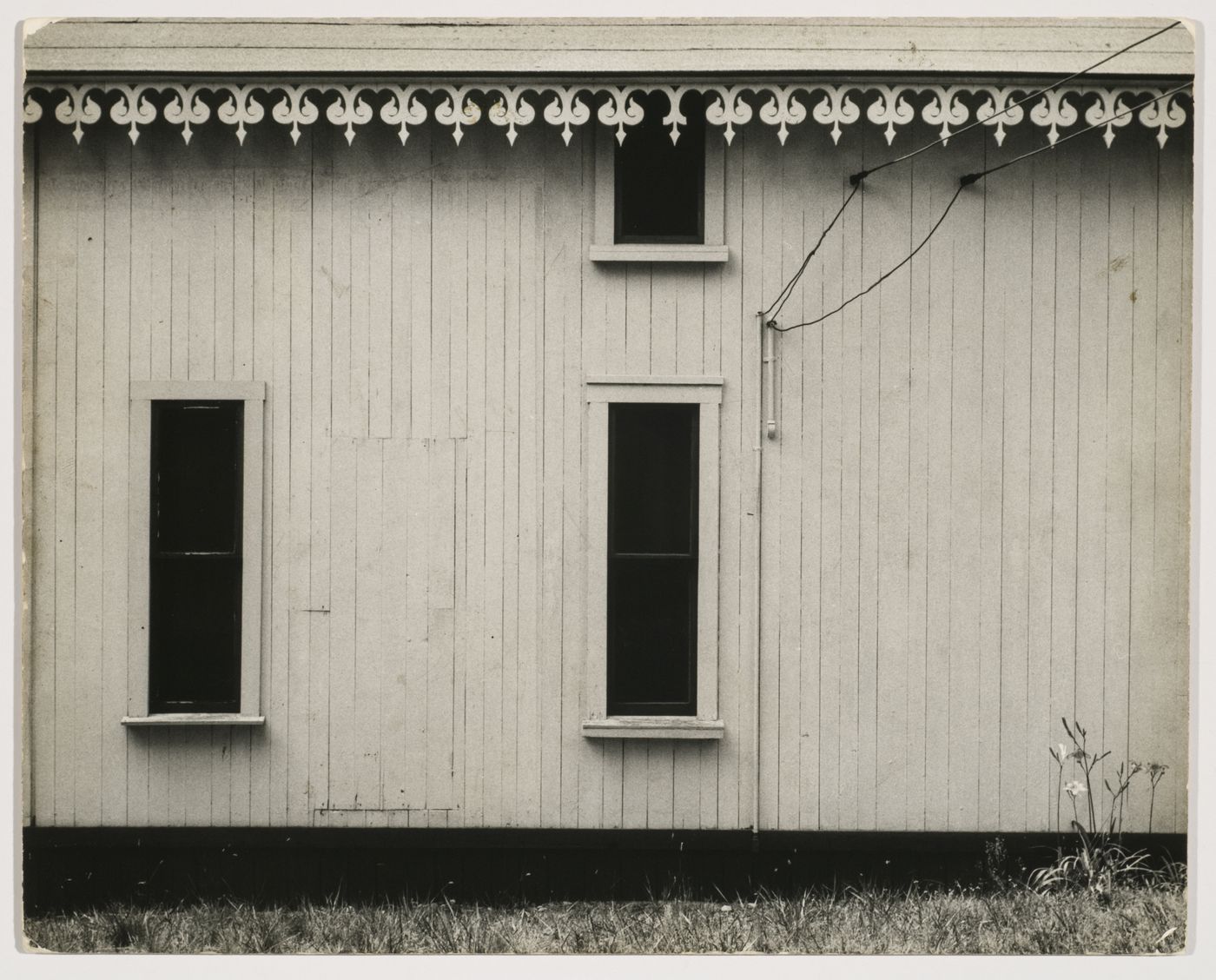 Study of wooden building with cut-out roof trim, Tabernacle City, Massachusetts