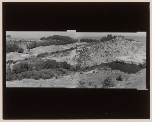 Panoramic composite photograph of the San Rafael Rock Quarry showing hills, a lake and trees with San Francisco Bay in the distance, Point San Pedro, San Rafael, Marin County, California, United States