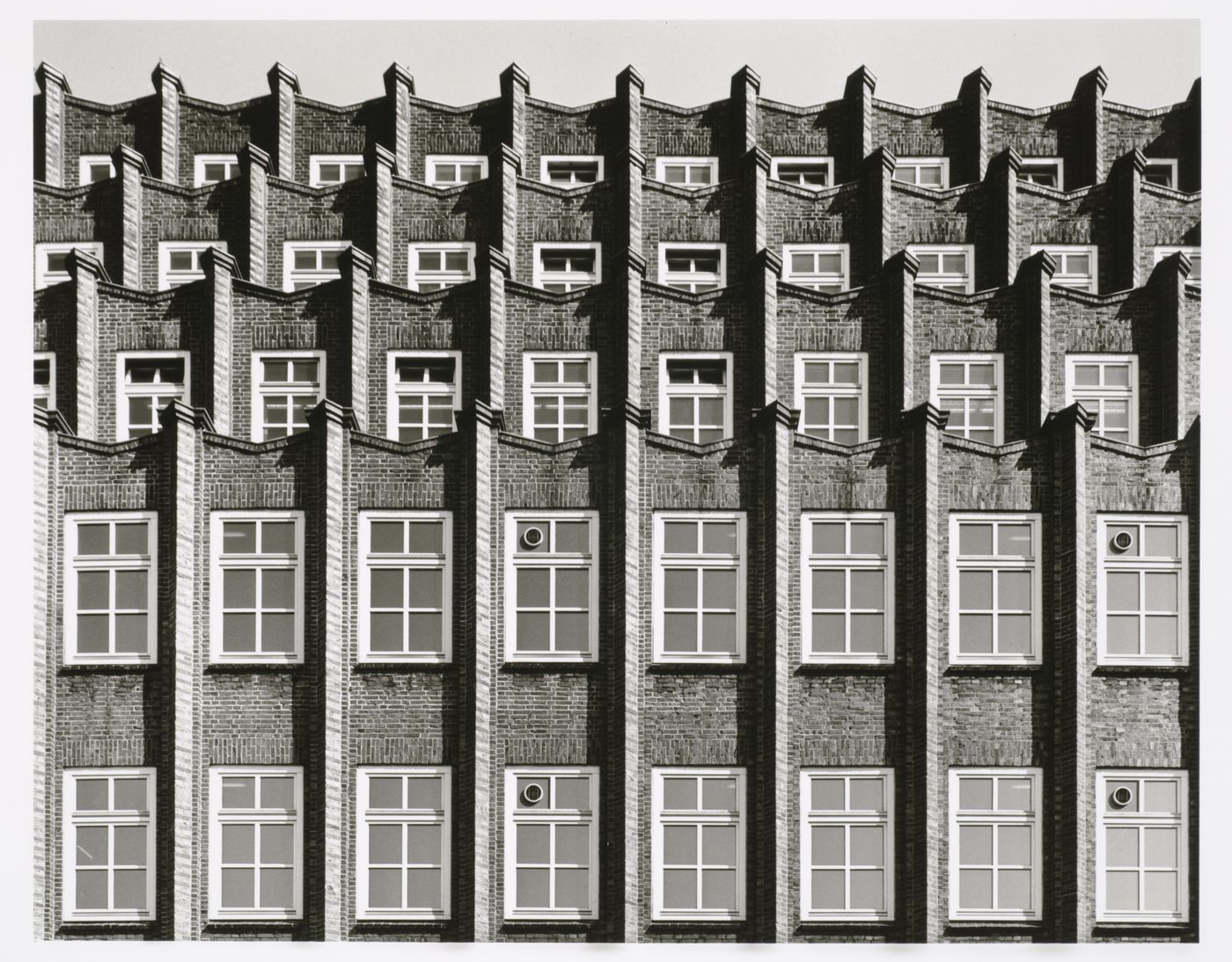 Partial view of the principal façade of Post- und Fernmeldeamt [Post and Telephone Records Office ?] showing the upper storeys, Niedernstrasse 10, Hamburg, Germany