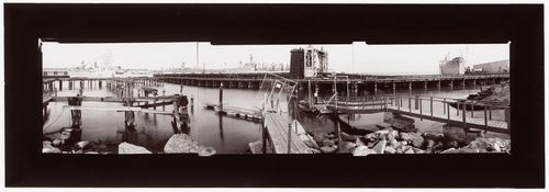 Panoramic composite photograph of China Basin harbour showing piers, docks and ships, with Mission Rock Terminal (also known as Pier 50) in the background, San Francisco, United States