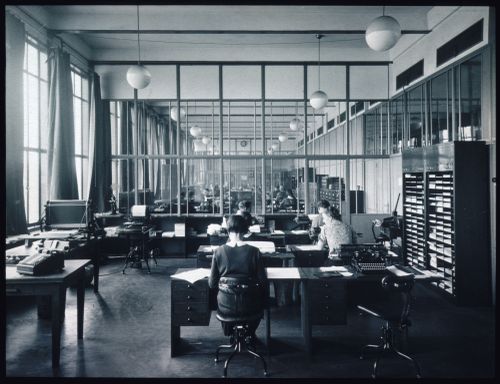 View of  the interior of an office with glass partitions