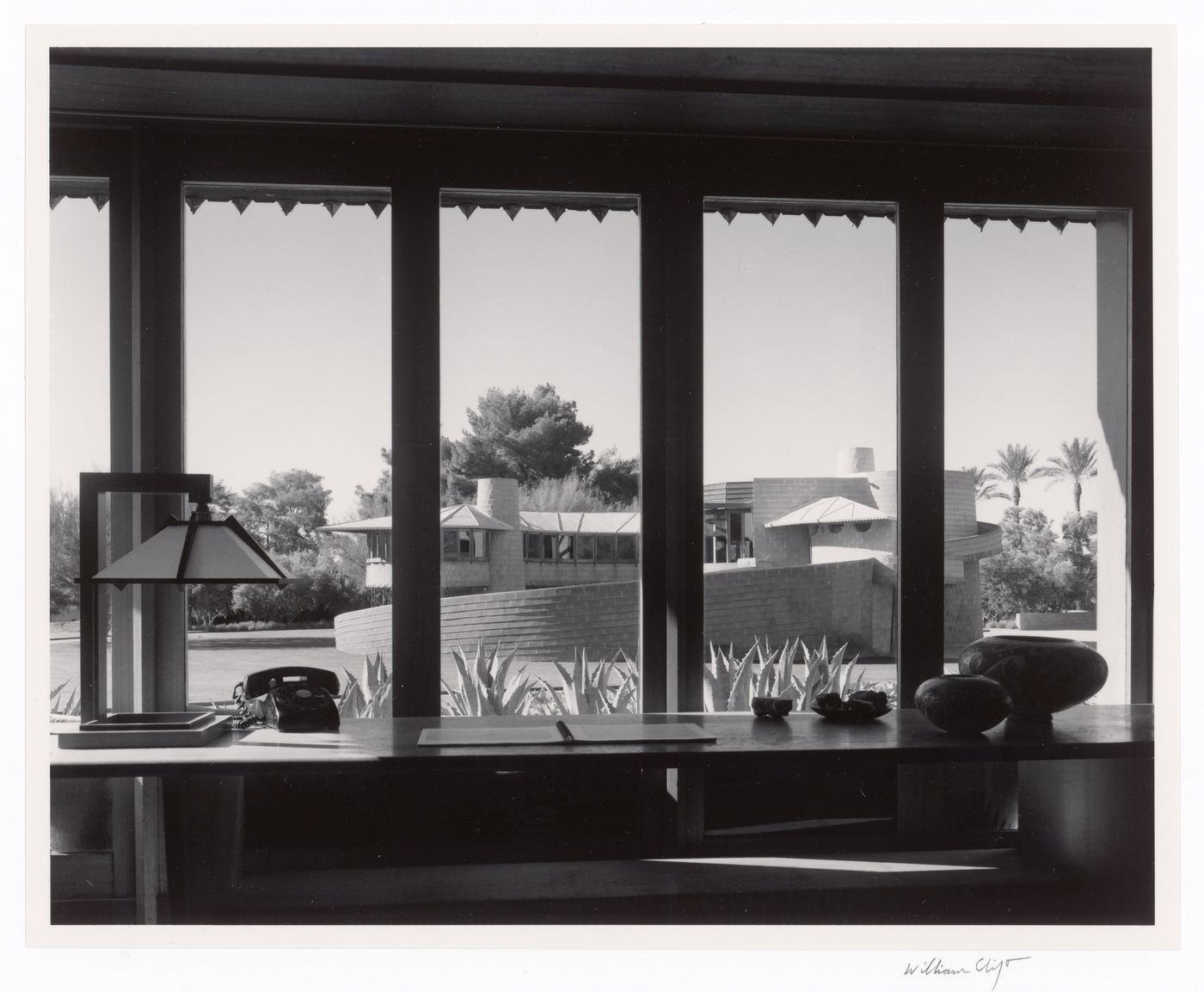 Main house seen through guest house windows, from the series The David and Gladys Wright House