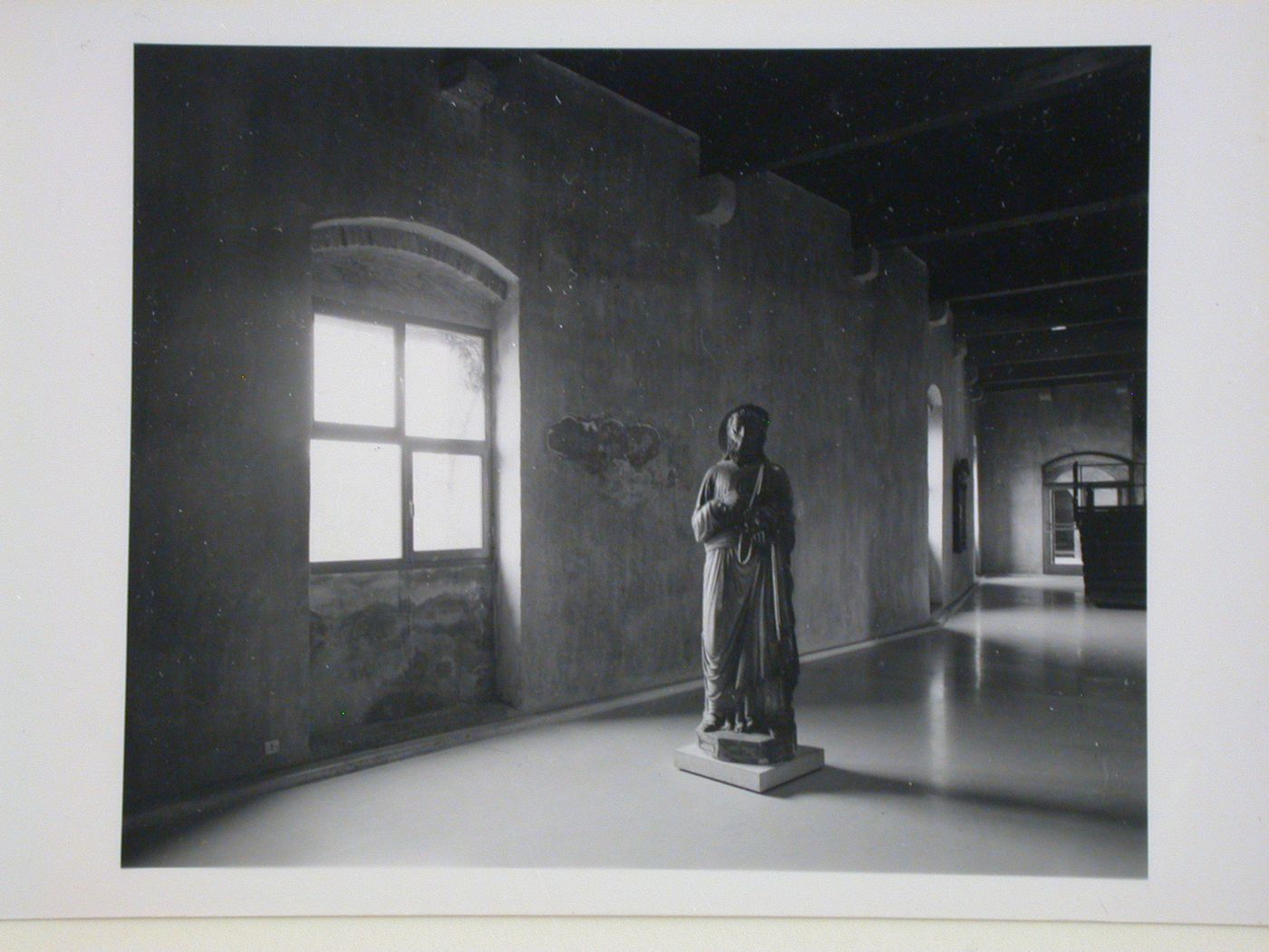 Interior view of a gallery showing a statue and window, Museo di Castelvecchio, Verona, Italy