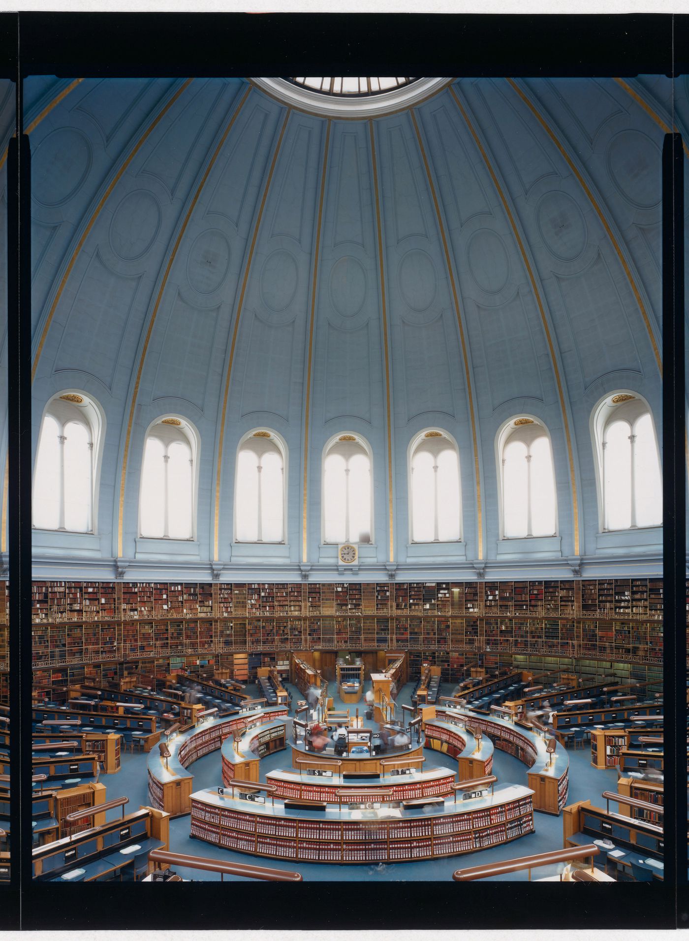 Partial interior view of the Reading Room showing the domed roof, galleries and desks, the British Library, London, England