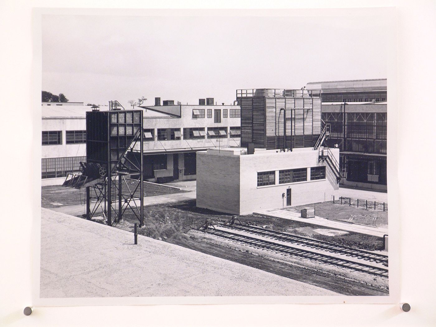 View of a courtyard showing the Manufacturing Building, Pump House and Chip Hopper, General Motors Corporation New Departure division Automobile [?] Assembly Plant, Sandusky, Ohio