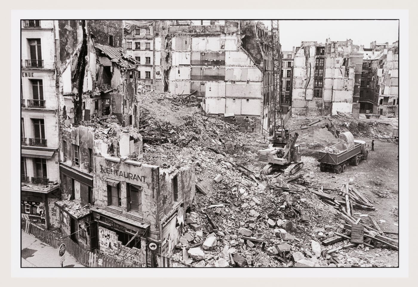 View of demolition of Conical Intersect with heavy machinery, Paris