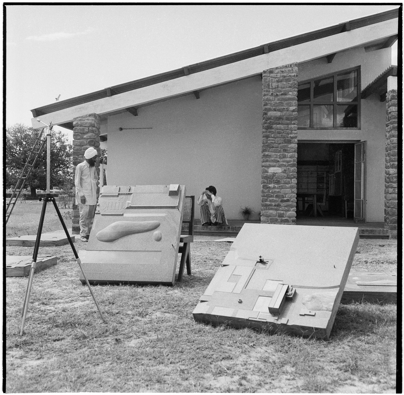 Giani Rattan Singh (standing) at the Architects' Office, Sector 19, with 2 components of a model for the Capitol Complex, Chandigarh, India