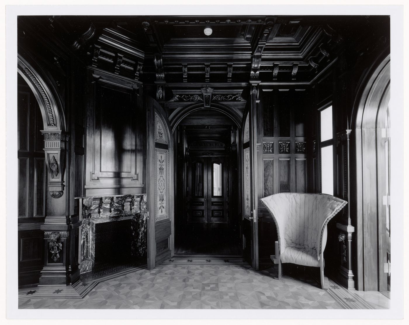 Interior view of the tea room showing a Feltri Armchair and the fireplace, Shaughnessy House under renovation, Montréal, Québec