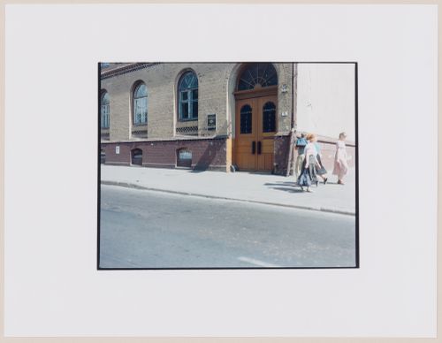 View of a building showing a doorway, a street, and people, Kaliningrad, Kaliningradskaia oblast', Russia (from the series "In between cities")