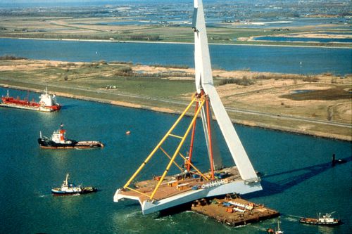 View of completed pylon being floated down the River Maas, Erasmus Bridge construction, Rotterdam