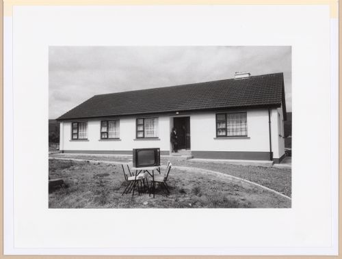 Bungalow and TV set on chairs in front, Keadue, County Roscommon, Ireland