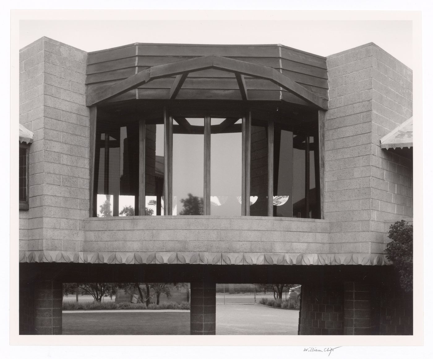 Late evening view of living room windows from ramp, from the series The David and Gladys Wright House