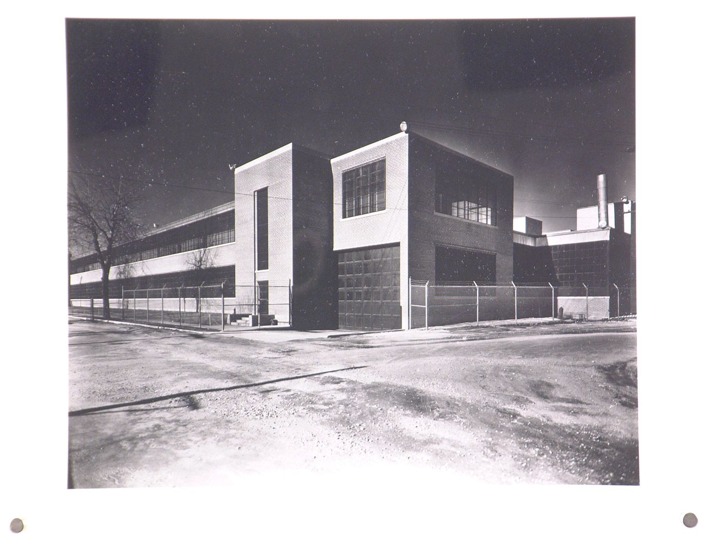 View of the principal and lateral façades of the Administration Building and Assembly Building, Fairchild Corporation Ranger Aircraft Engines division Assembly Plant, Farmingdale, New York