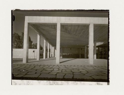 Exterior view of the Chapel of the Holy Cross, the loggia of Monument Hall and the Way of the Cross walkway, Woodland Crematorium and Cemetery, Stockholm