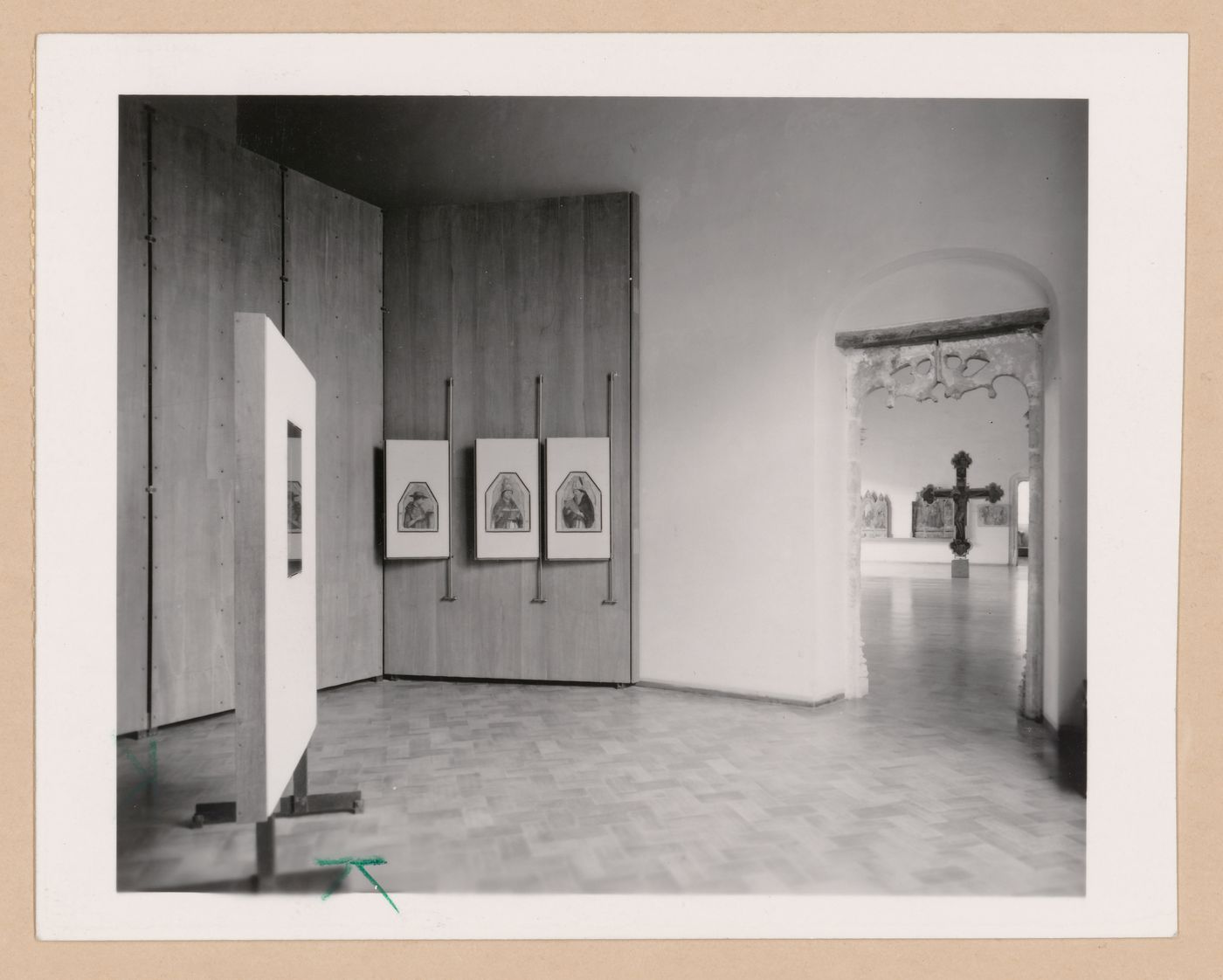 Interior view of a gallery showing paintings with Il Salone in the right background, Palazzo Abatellis, Galleria regionale della Sicilia, Palermo, Italy