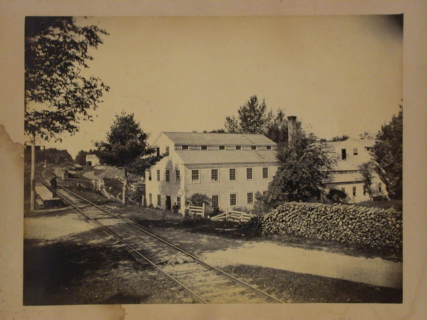 Linseed oil mill, with railroad tracks in foreground, South Middleton, Massachusetts