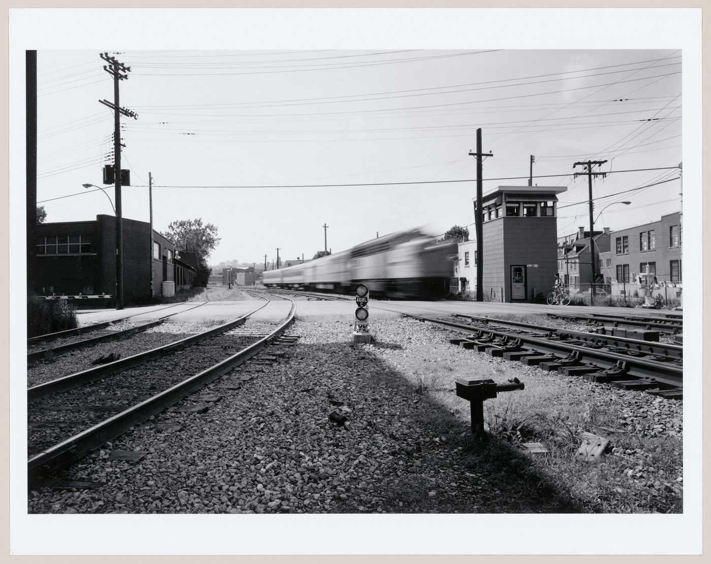 View of the Canadian National St. Ambroise grade crossing at the Coleco Building (formerly the Merchants Manufacturing Company Building), Montréal, Québec