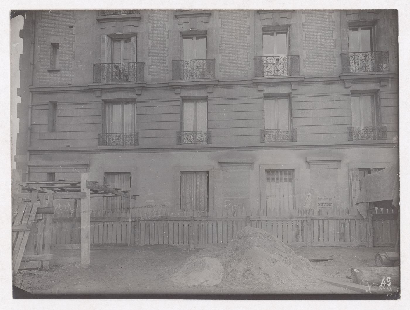 Construction of the Paris Metro, view of a building with evidence of construction in foreground, Paris, France