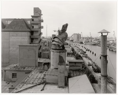 View of buildings, docks, a canal, ships and silos, Malteria Adriatica, Marghera, Italy