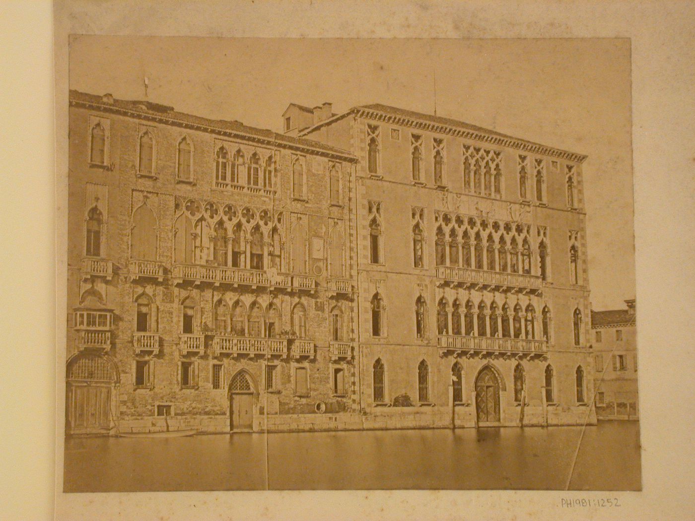 View of the Grand Canal showing the Palazzo Giustinian Lolin on the left and the Università degli studi di Venezia on the right, Venice, Italy